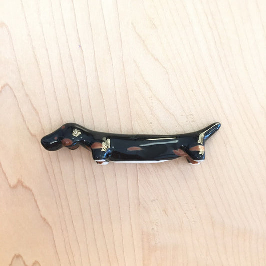 Soporte de palillos - perro salchicha -